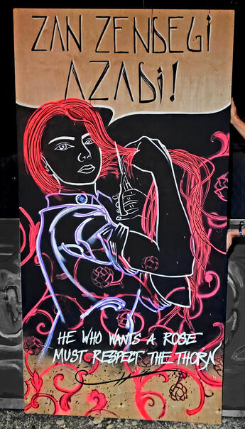 Woman Life Freedom, spray paint on wood panel, 2022
